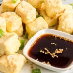 tofu nuggets served with soy sauce