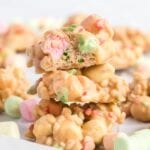 Stack of peanut butter marshmallow cookies with bite taken out.