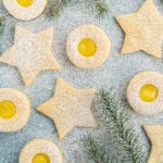 Shortbread cookies cut like stars and shortbread filled with lemon curd.