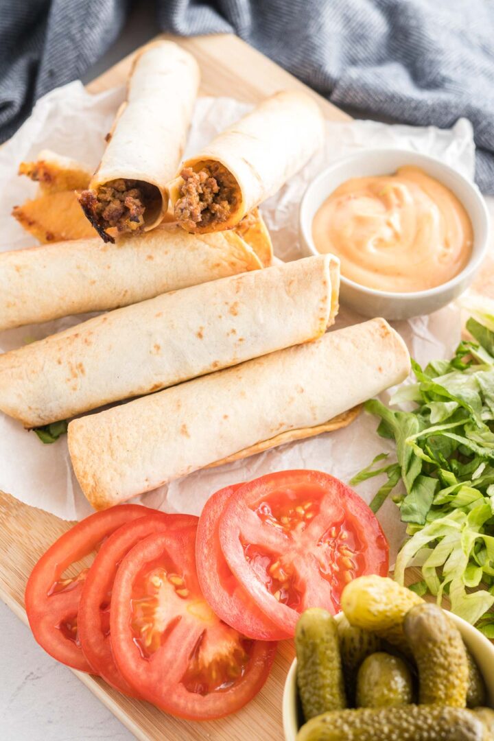 Baked Cheeseburger Taquitos Tastes of Homemade