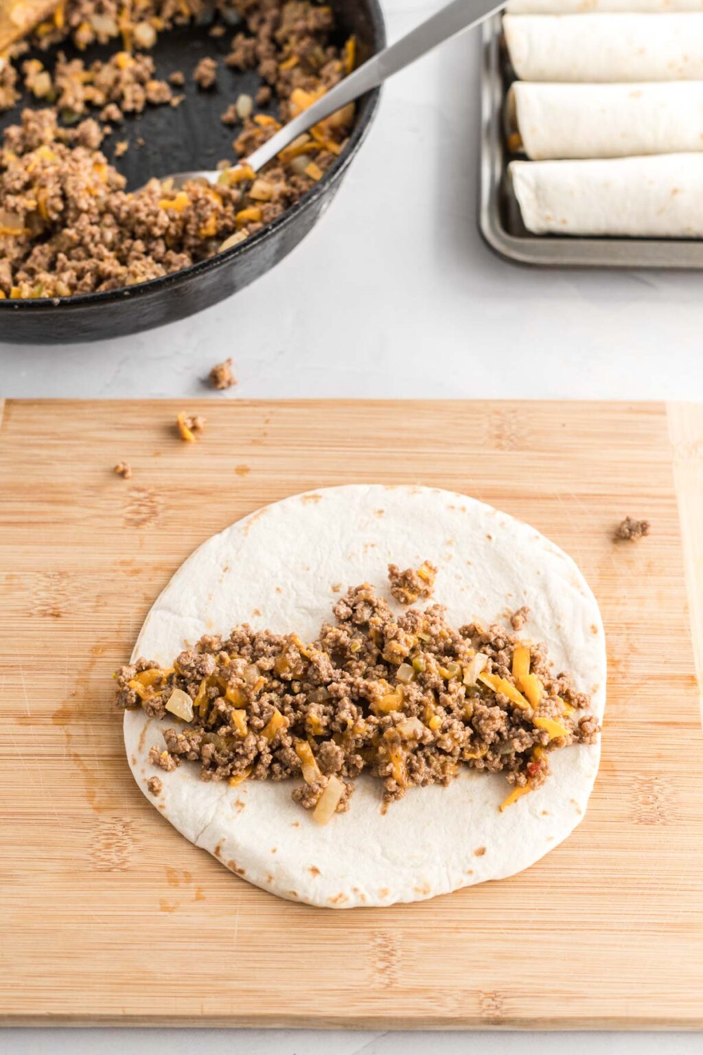 Baked Cheeseburger Taquitos Tastes of Homemade