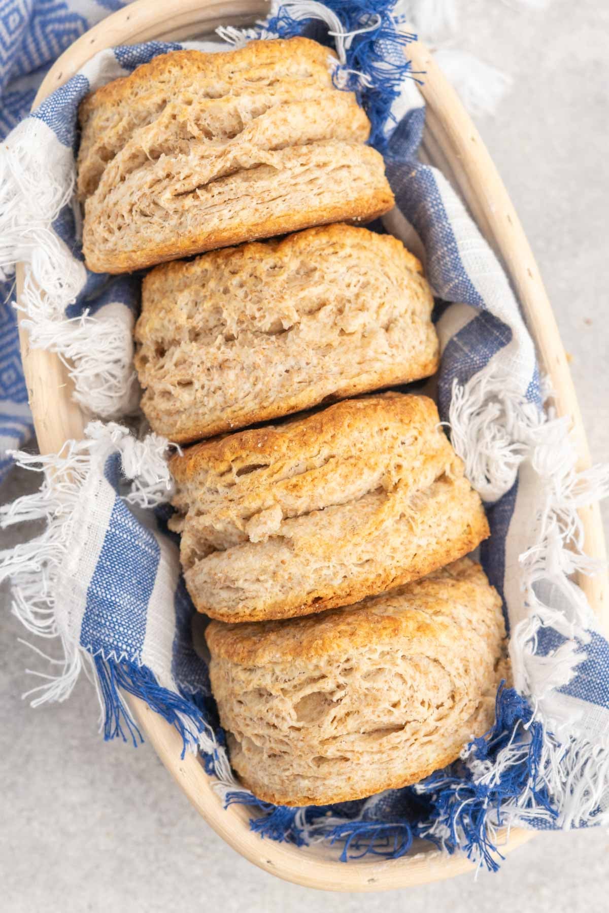 Whole wheat scones in a cloth lined basket.