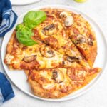 Flatbread pizza with pepperoni and mushrooms.